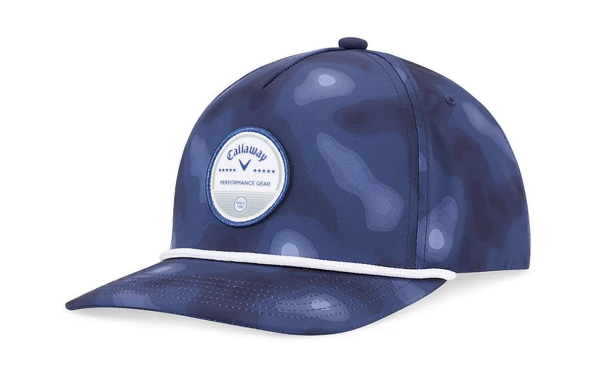 Blue camouflage cap with a white logo patch on the front and a white accent on the brim.